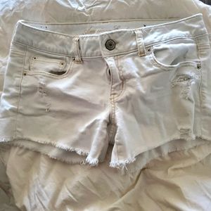 White distressed denim shorts American eagle